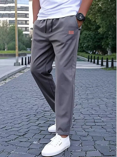 2025European men's casual workwear sports pants with drawstring at waist, jogging and hiking, loose pants with multiple pockets